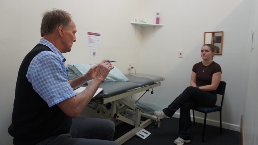Acupuncture-Talking-With-Client-Before-Treatment-christchurch